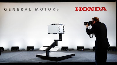 A photographer captures images of the General Motors-Honda Next Generation Fuel Cell.
