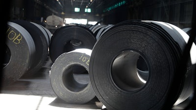 In this June 28, 2018 file photo, rolls of finished steel are seen at the U.S. Steel Granite City Works facility in Granite City, Ill.