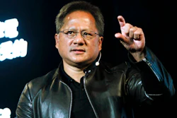In this Tuesday, May 30, 2017 file photo, Nvidia CEO Jensen Huang delivers a speech about AI and gaming during the Computex Taipei exhibition at the world trade center in Taipei, Taiwan. Computer graphics chip company Nvidia said it plans to buy Britain's Arm Holdings for $40 billion, in a merger of two leading chipmakers. Santa Clara, California-based Nvidia and Arm's parent company, Japanese technology giant SoftBank, announced the deal Sunday, Sept. 13, 2020.