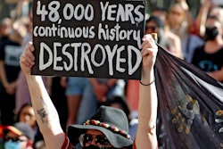 Protesters rally outside the Rio Tinto office after the destruction of Australian Indigenous sacred sites in Perth.