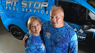 Amy and Cody Morgan pose in their new warehouse, Sept. 4, 2020, in Cypress, Texas.