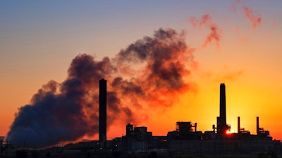 In this July 27, 2018, file photo, the Dave Johnston coal-fired power plant is silhouetted against the morning sun in Glenrock, Wyo. Wyoming's governor is promoting a Trump administration study that says capturing carbon dioxide emitted by coal-fired power plants would be an economical way to curtail the pollution — findings questioned by a utility that owns the plants and wants to shift away from the fossil fuel in favor of wind and solar energy. Supporters say carbon capture would save coal by pumping carbon dioxide — a greenhouse gas emitted by power plants — underground instead of into the atmosphere.