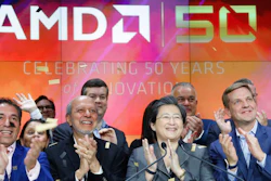 In this May 1, 2019, file photo, Lisa Su, second from right, president and CEO of AMD, attends the opening bell at Nasdaq to celebrate its 50th anniversary in New York. AMD is buying processing platform developer Xilinx in an all-stock deal valued at $35 billion.