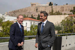 Microsoft President Brad Smith, left, speaks with Greek Prime Minister Kyriakos Mitsotakis during a ceremony in the Acropolis Museum, Athens, Oct. 5, 2020.