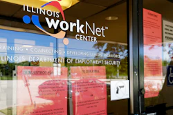 Information signs are displayed at the closed Illinois Department of Employment Security WorkNet center in Arlington Heights, Ill.