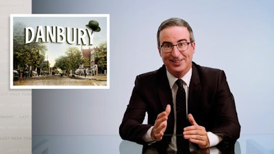 This video frame grab shows John Oliver from his 'Last Week Tonight with John Oliver' program on HBO, Sunday, Aug. 30, 2020. On Aug. 22, Danbury, Conn., Mayor Mark Boughton announced a tongue-in-cheek move posted on his Facebook page to rename Danbury's local sewage treatment plant after Oliver following the comedian's expletive-filled rant about the city. Oliver then offered to donate $55,000 to charity if the city actually followed through with it. On Thursday, Oct. 8, the Danbury City Council voted 18-1 to rename the sewage plant after the comedian.