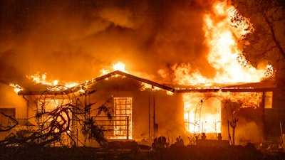 House burns on Platina Road at the Zogg Fire near Ono, Calif.