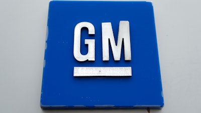 This Monday, Jan. 27, 2020, photo shows the General Motors logo. General Motors is expected to reveal that it will build the Cadillac Lyriq electric SUV at its factory in Spring Hill, Tenn., when it makes a major manufacturing announcement Tuesday, Oct. 20, 2020.