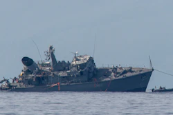 Α damaged navy minesweeper towed near the port of Piraeus, Oct. 27, 2020.