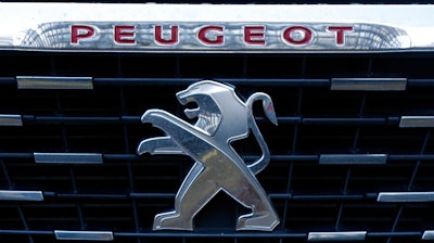 Logo of the French car maker Peugeot is pictured in Paris.