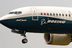 In this Sept. 30, 2020, file photo, a Boeing 737 MAX jet, piloted by Federal Aviation Administration (FAA) chief Steve Dickson, prepares to land at Boeing Field following a test flight in Seattle. Boeing says the pandemic will reduce demand for new planes for the next decade, long after experts expect a vaccine for COVID-19. The company updated its forecast of the airplane market on Tuesday, Oct. 6, 2020. It remains upbeat about long-term prospects driven by increasing air travel in Asia. Boeing, which along with Europe’s Airbus dominates the aircraft-building industry, has seen orders and deliveries of new planes crumble this year.