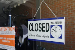 In this July 18, 2020 file photo a closed sign hangs in the window of a barber shop in Burbank, Calif. A critical snapshot of the job market and the economy to be released Friday, Oct. 2, is expected to show a further deceleration in hiring as the nation’s viral caseload creeps higher just as financial aid from the government has faded.