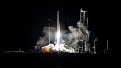 Northrup Grumman's Antares rocket lifts off the launch pad at the NASA Wallops test flight facility, Friday, Oct. 2, 2020, in Wallops Island, Va. The rocket will deliver supplies to the International Space Station.