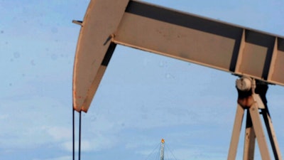 This Feb. 21, 2012 file photo, shows equipment in the oil fields of the Uintah Basin, southeast of Vernal, Utah. The Government Accountability Office, a U.S. government watchdog agency, s faulting the Trump administration’s handling of a COVID-19 relief effort that awarded energy companies breaks on payments for oil and gas extracted from public lands in Western states in more than 500 cases.