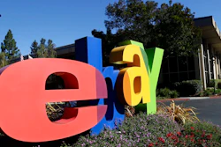 In this Oct. 17, 2012, file photo, an eBay sign sits in front of the company's headquarters in San Jose, Calif. On Wednesday, Sept. 23, 2020, federal prosecutors said four former eBay Inc. employees had agreed to plead guilty to their roles in a campaign of intimidation that included sending live spiders and cockroaches to the home of a Massachusetts couple who ran an online newsletter highly critical of the auction site.