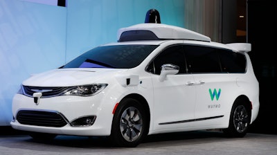 Chrysler Pacifica hybrid outfitted with Waymo's suite of sensors and radar.