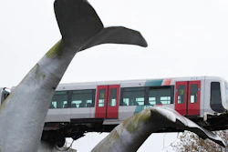 The front carriage of a metro train perched on a whale sculpture after ramming through the end of an elevated rail section, Spijkenisse, Netherlands, Nov. 2, 2020.