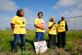 Myrtle Felton, from left, Sharon Lavigne, Gail LeBoeuf and Rita Cooper, members of RISE St. James, conduct a live stream video on property owned by Formosa in St. James Parish, La.
