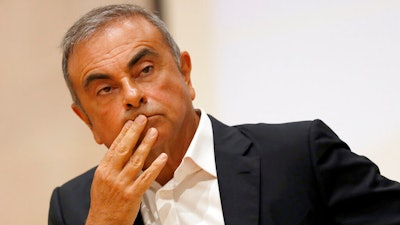 Former Nissan Motor Co. Chairman Carlos Ghosn holds a press conference.