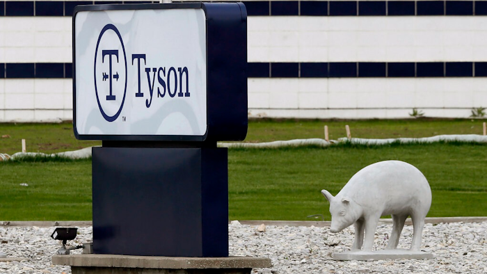 In this May 1, 2020, file photo, a sign sits in front of the Tyson Foods plant in Waterloo, Iowa. The coronavirus devastated the nation's meatpacking communities in Iowa, Nebraska, and Minnesota earlier in the year. Behemoths like Walmart and Tyson, which have been the target of COVID-19-related lawsuits, can largely absorb any losses. But hundreds of negligence lawsuits have been filed across the country, with mom-and-pops most fearing the prospect of litigation that could put them under.