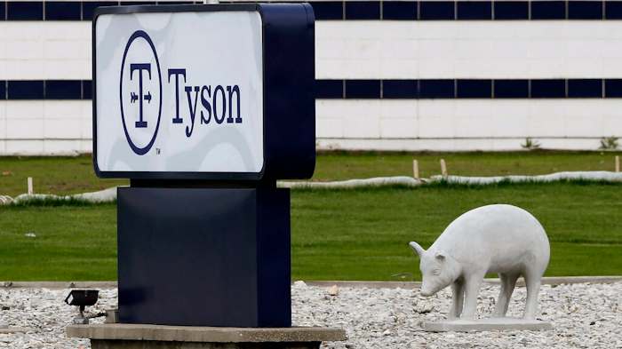 In this May 1, 2020, file photo, a sign sits in front of the Tyson Foods plant in Waterloo, Iowa. The coronavirus devastated the nation's meatpacking communities in Iowa, Nebraska, and Minnesota earlier in the year. Behemoths like Walmart and Tyson, which have been the target of COVID-19-related lawsuits, can largely absorb any losses. But hundreds of negligence lawsuits have been filed across the country, with mom-and-pops most fearing the prospect of litigation that could put them under.