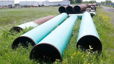Pipeline used to carry crude oil is shown at the Superior, Wis., terminal of Enbridge Energy.