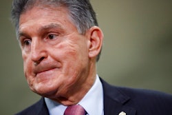Sen. Joe Manchin, D-W.Va., speaks with reporters on Capitol Hill in Washington, Feb. 5, 2020.