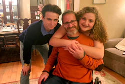 Samuel Kolb, seated, poses for a photo with his son Jacob and daughter Lexi in San Mateo, Calif., Nov. 2019.