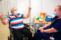 Henry (Jack) Vokes, 98, reacts receiving the Pfizer-BioNTech COVID-19 vaccine at Southmead Hospital, Bristol, England, Dec. 8, 2020.