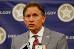 Oklahoma Attorney General Mike Hunter speaks during a news conference in Oklahoma City.