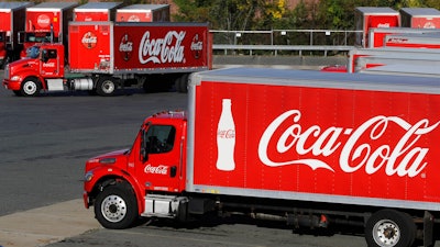 A truck with the Coca-Cola logo.