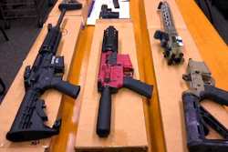 This Nov. 27, 2019, file photo shows 'ghost guns' on display at the headquarters of the San Francisco Police Department in San Francisco. Families of those killed and wounded in a rural California shooting rampage in 2017 are suing manufacturers and sellers of 'ghost gun' kits that provide easy-to-assemble firearm parts that make it difficult to track or regulate owners.