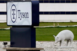 In this May 1, 2020, file photo, a sign sits in front of the Tyson Foods plant in Waterloo, Iowa. The coronavirus devastated the nation's meatpacking communities in Iowa, Nebraska, and Minnesota earlier in the year. Behemoths like Walmart and Tyson, which have been the target of COVID-19-related lawsuits, can largely absorb any losses. But hundreds of negligence lawsuits have been filed across the country, with mom-and-pops most fearing the prospect of litigation that could put them under.