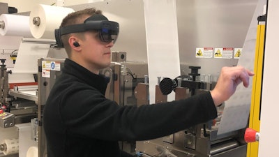 A Delta ModTech employee using Microsoft’s HoloLens technology.