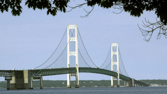 This July 19, 2002, file photo, shows the Mackinac Bridge that spans the Straits of Mackinac from Mackinaw City, Mich. Michigan's environmental agency said Friday, Jan. 29, 2021, it had approved construction of an underground tunnel to house a replacement for a controversial oil pipeline in a channel linking two of the Great Lakes.