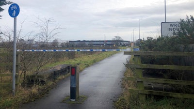 A police cordon at Wrexham Industrial Estate near the British pharmaceutical manufacturing company Wockhardt, Wrexham, Wales, Jan. 27, 2021.