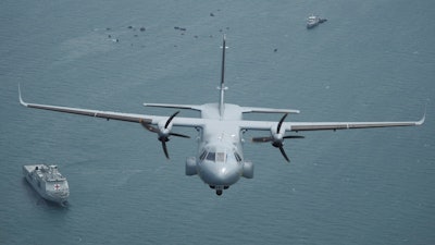 Indonesian Navy's aircraft flies as the search for the wreckage of a crashed Sriwijaya Air passenger jet continues.