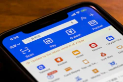 This July 20, 2020, file photo, shows, the app for Alipay, the mobile payments service operated by Ant Group, on a smartphone in Beijing. President Donald Trump has signed an executive order banning transactions with eight Chinese apps, including Alipay and WeChat Pay. However, the order goes into effect after President-elect Joe Biden takes office, so the order's ultimate fate is unclear.