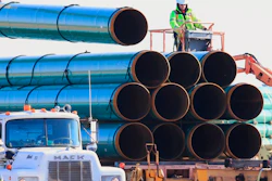 In this May 9, 2015, file photo, workers unload pipes in Worthing, S.D., for the Dakota Access oil pipeline that stretches from the Bakken oil fields in North Dakota to Illinois. A federal appeals court on Tuesday, Jan. 26, 2021, upheld the ruling of a district judge who ordered a full environmental impact review of the Dakota Access pipeline in North Dakota. Following a complaint by the Standing Rock Sioux Tribe, U.S. District Judge James Boasberg said in April 2020 that a more extensive review was necessary than the one already conducted by the U.S. Army Corps of Engineers.
