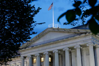 This file photo shows the U.S. Treasury Department building at dusk in Washington. The Corporate Transparency Act, enacted into law on Jan. 1, 2021, seeks to strengthen controls by creating a corporate registry managed by the Treasury Department.