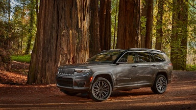 This photo provided by Fiat Chrysler shows the 2021 Jeep Grand Cherokee L Summit Reserve. Fiat Chrysler unveiled the Grand Cherokee L on Thursday, Jan. 7, 2021 and said production would start by the end of March. The company invested $1.6 billion to revamp two old engine plants so they could build new versions of the popular SUV.