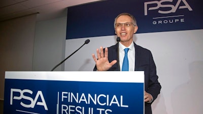 In this Wednesday, Feb. 26, 2020 file photo, CEO of PSA Groupe Carlos Tavares arrives for the presentation of the company's 2019 full year results in Rueil-Malmaison, west of Paris. Fiat Chrysler Shareholders of Fiat Chrysler and France's PSA Group are meeting Monday, Jan. 4, 2021 to vote on a merger that will create the world's fourth-largest automaker. The new company called Stellantis will be run by PSA CEO Carlos Tavares, who is known for cutting vehicles or ventures that don't make money.