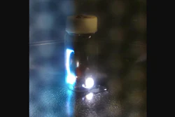Sparks generated inside a glass vial containing coal powder and copper foil in a microwave oven.