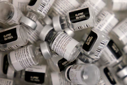In this file photo, empty vials of the Pfizer-BioNTech COVID-19 vaccine are seen at a vaccination center at the University of Nevada, Las Vegas in Las Vegas.