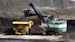 A mechanized shovel loads a haul truck with coal at the Spring Creek coal mine near Decker, Mont., April 4, 2013.