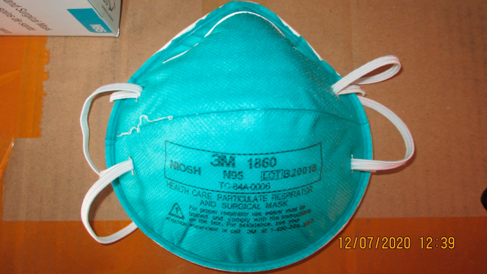 This December 2020 image provided by U.S. Immigration and Customs Enforcement (ICE) shows a counterfeit N95 surgical mask that was seized by ICE and U.S. Customs and Border Protection.