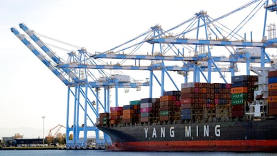 A Yang Ming Marine Transport Corporation boat at the Port of Tacoma in Tacoma, Wash., Nov. 4, 2019.