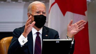 President Joe Biden holds a virtual bilateral meeting with Canadian Prime Minister Justin Trudeau, in the Roosevelt Room of the White House on Feb. 23 in Washington.