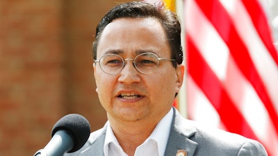 In this Aug. 22, 2019 file photo, Cherokee Nation Principal Chief Chuck Hoskin Jr., speaks during a news conference in Tahlequah, Okla. The chief of the Cherokee Nation says it's time for auto maker Jeep to stop using the tribe's name on its Cherokee and Grand Cherokee models. Chief Chuck Hoskin Jr. said in a statement he believes corporations and team sports should stop using Native American names, images and mascots on their teams and products.