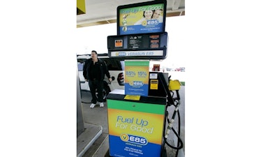 This April 4, 2007 file photo, shows a gas pump in that delivers Ethanol fuel. The federal government announced Monday, Feb. 22, 2021, that it will support the ethanol industry in a lawsuit over biofuel waivers granted to oil refineries under President Donald Trump's administration. The Environmental Protection Agency said it is reversing course and will support a January 2020 decision by the Denver-based 10th U.S. Circuit Court of Appeals in a lawsuit filed by the Renewable Fuels Association and farm groups.